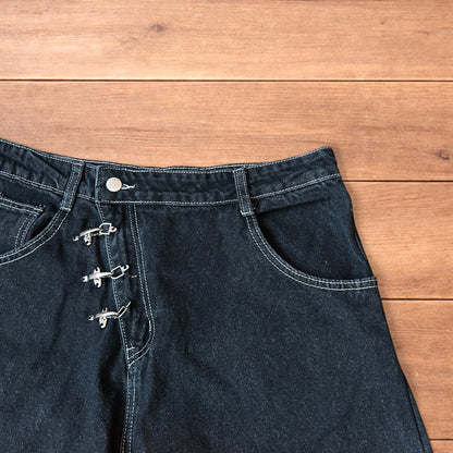 Vintage style baggy wide leg denim shorts jorts with buckles in black.