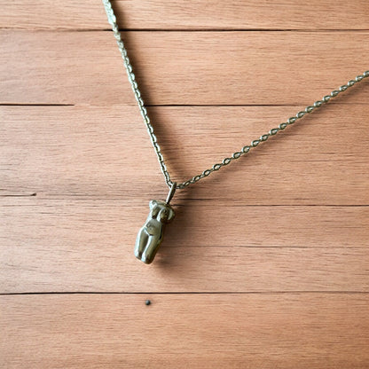 Lovely Gold stainless steel necklace of female woman figure silhouette body.