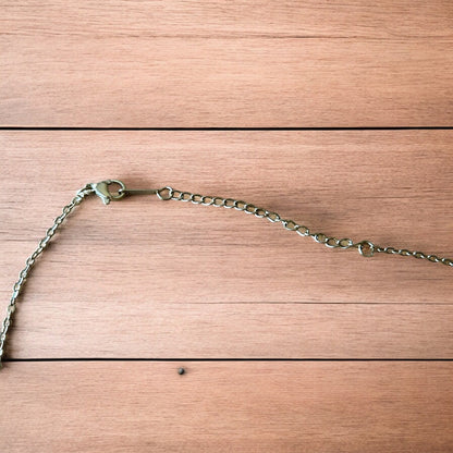 Lovely Gold stainless steel necklace of female woman figure silhouette body.