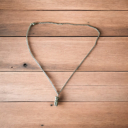 Lovely Gold stainless steel necklace of female woman figure silhouette body.