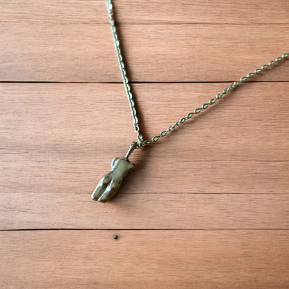 Lovely Gold stainless steel necklace of female woman figure silhouette body.