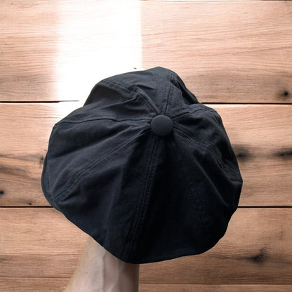 Vintage style newsboy painter flat cap beret in black.