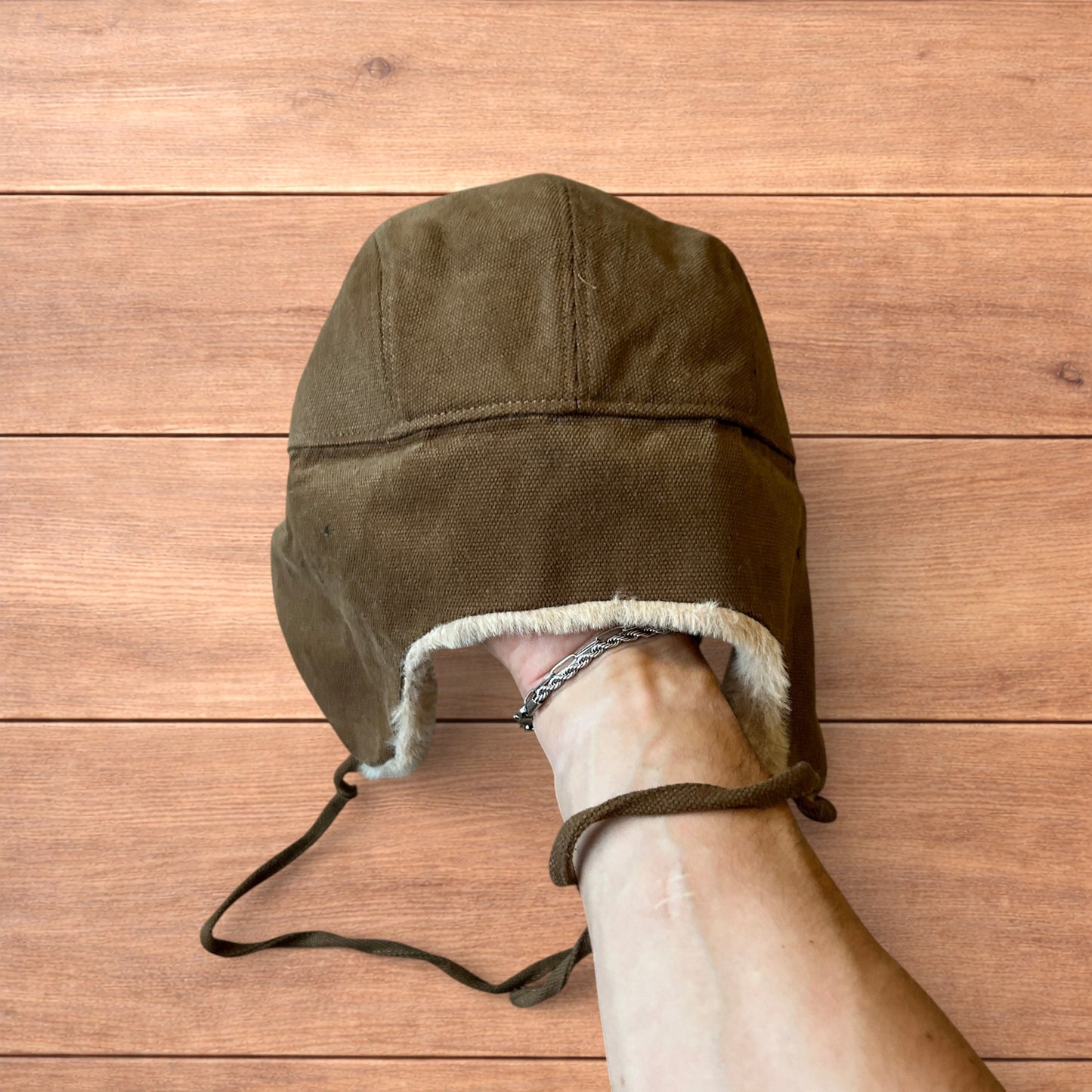 Russian ushanka trapper ear flap winter hat in brown/beige colour way.