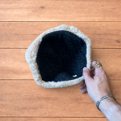 Russian ushanka trapper ear flap winter hat in brown/beige colour way.