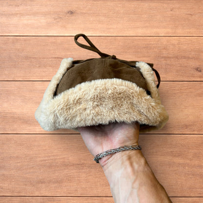 Russian ushanka trapper ear flap winter hat in brown/beige colour way.