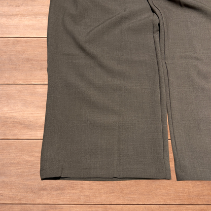 Vintage style baggy wide leg tailored brown trousers laid flat showing front, back, waistband, and clasp detail