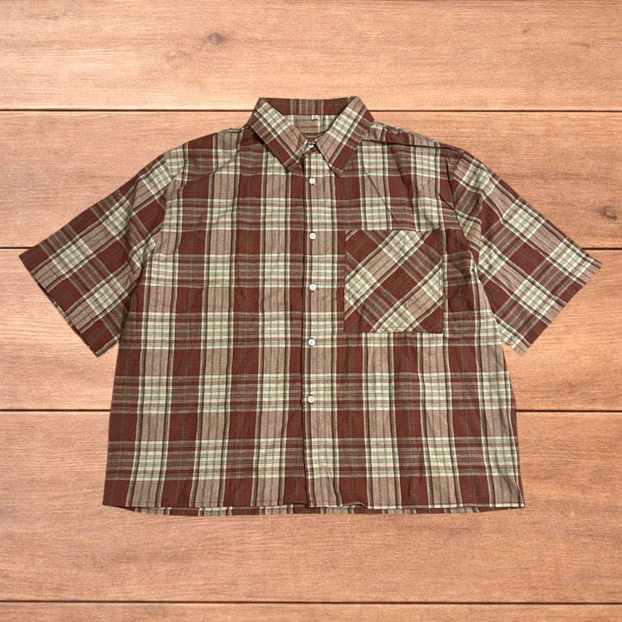 Vintage style checkered short sleeve button up shirt in red and beige laid flat showing front and back views