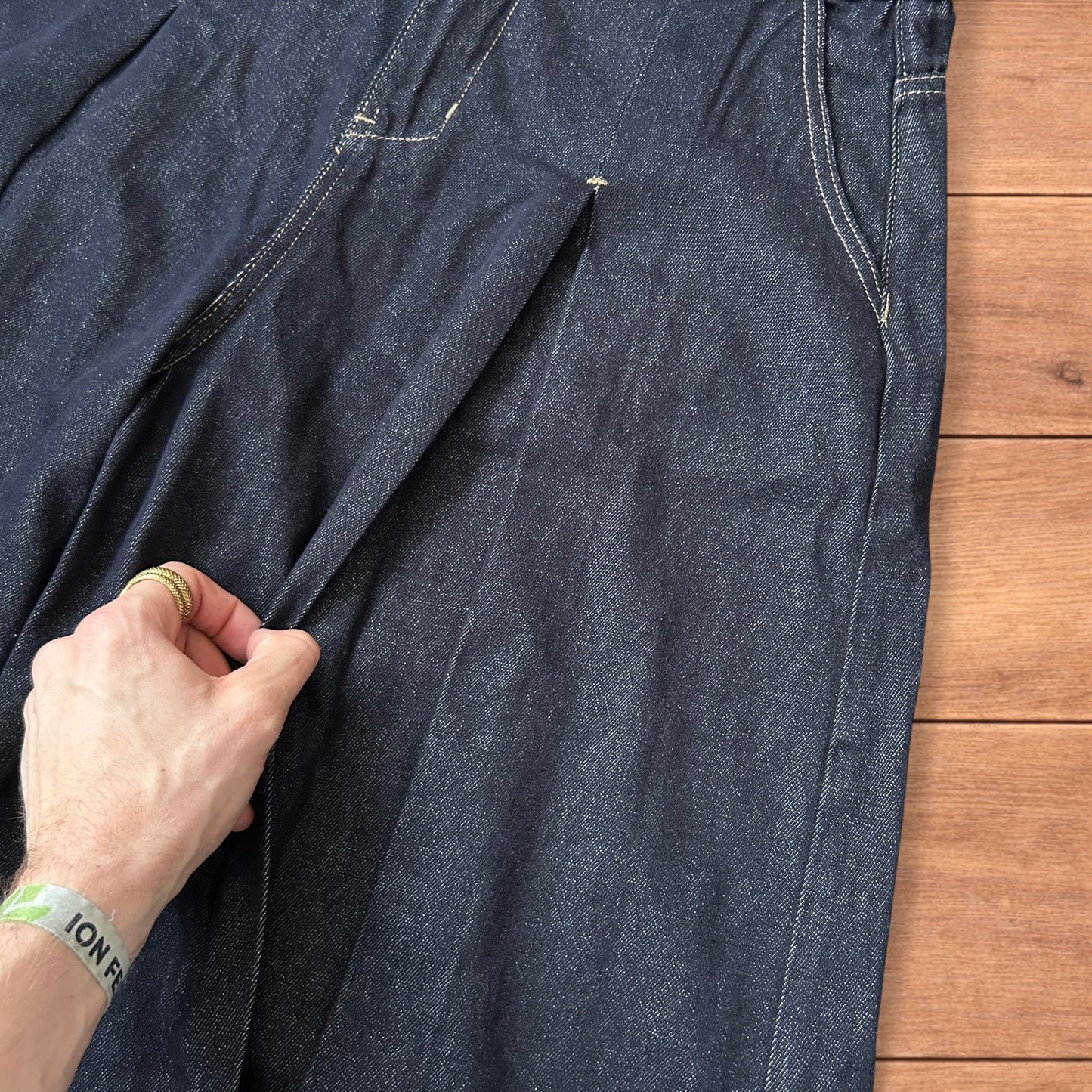Super baggy wide leg raw denim style 3/4 shorts jorts in dark indigo blue.