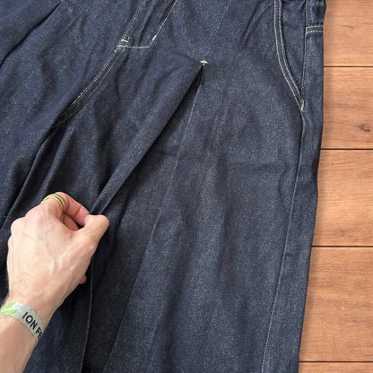 Super baggy wide leg raw denim style 3/4 shorts jorts in dark indigo blue.