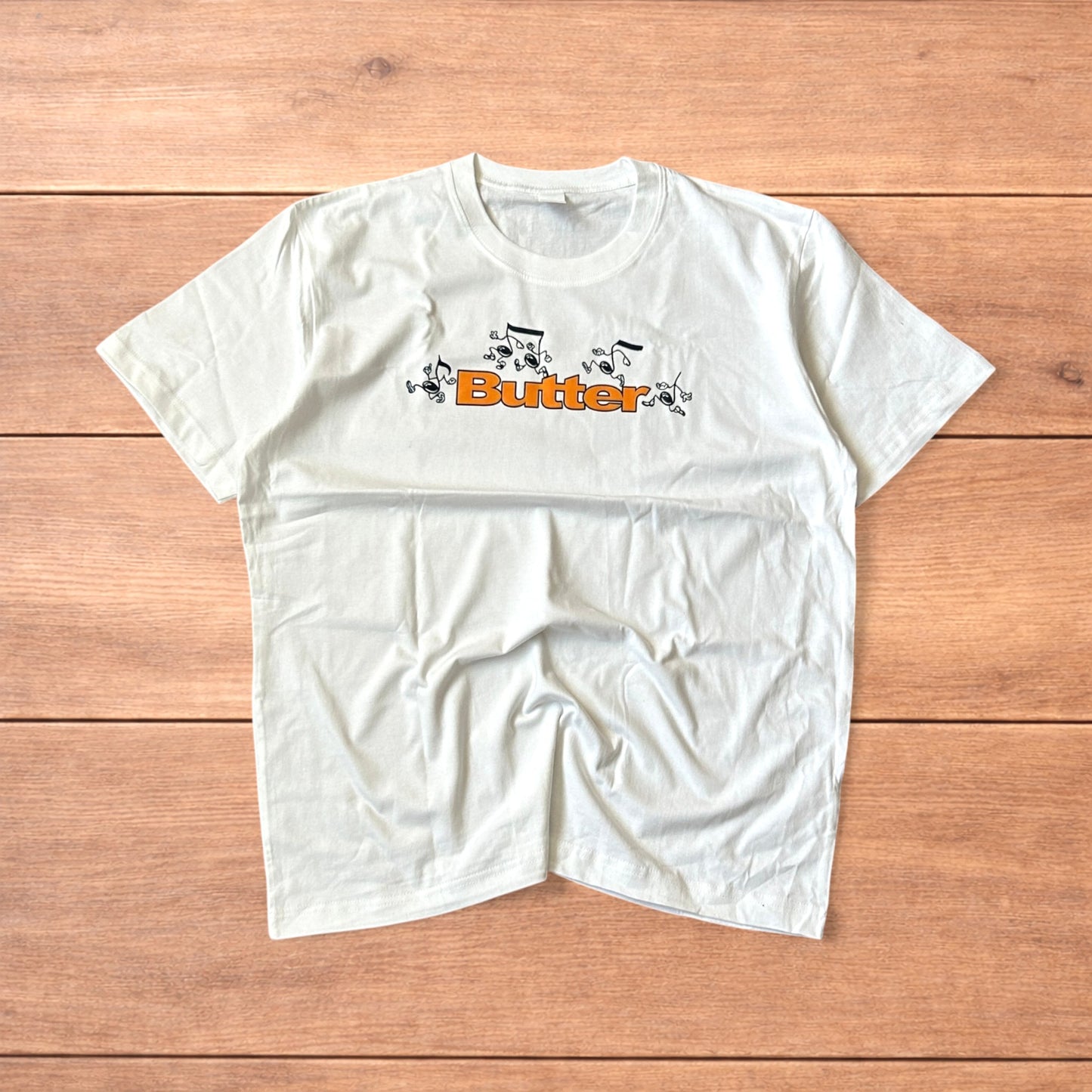 Butter skate relaxed fit graphic tshirt in white.