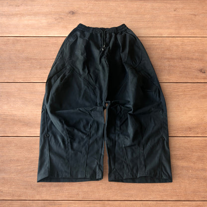 Incredible super baggy wide leg cargo trousers in black.