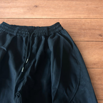 Incredible super baggy wide leg cargo trousers in black.