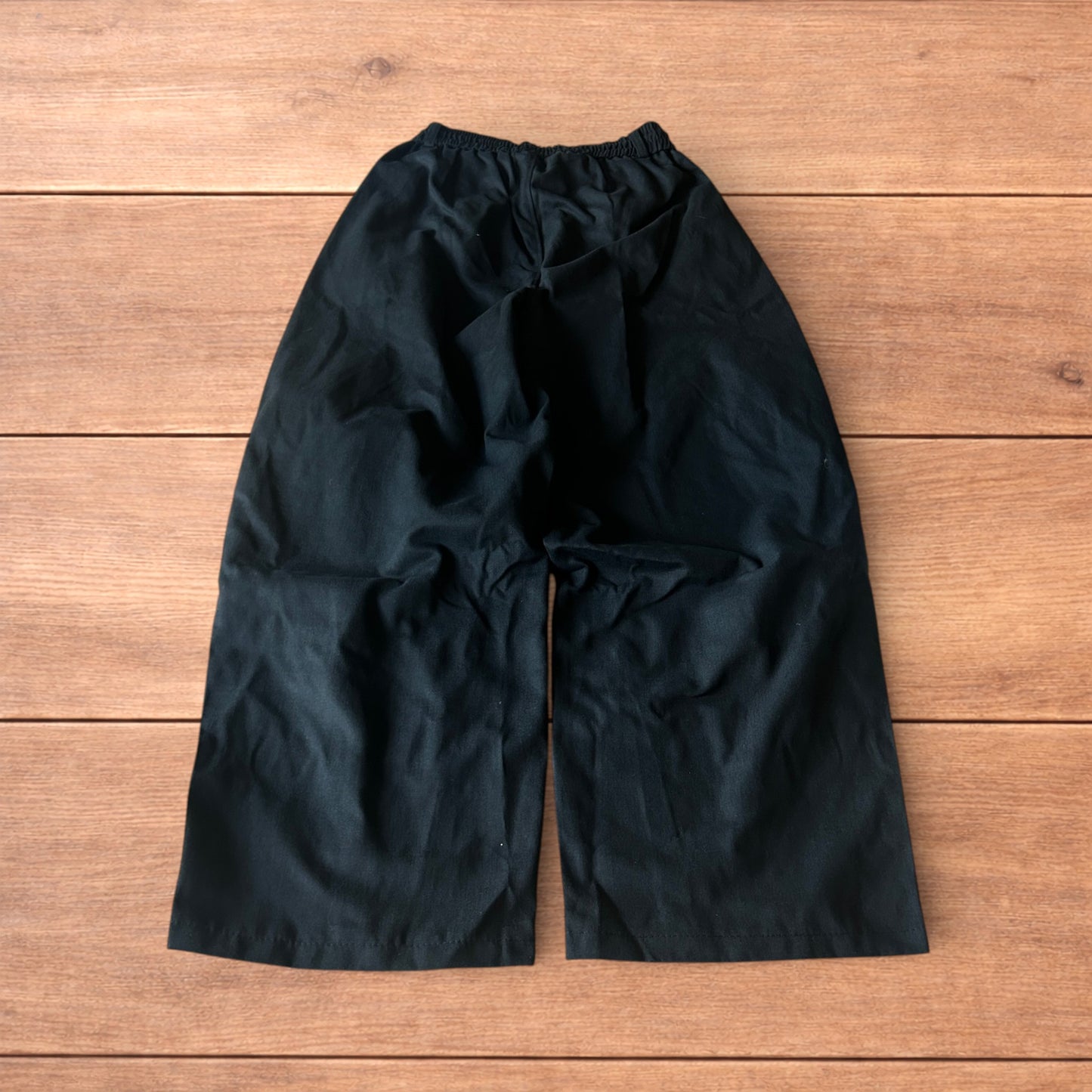 Incredible super baggy wide leg cargo trousers in black.