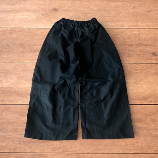 Incredible super baggy wide leg cargo trousers in black.