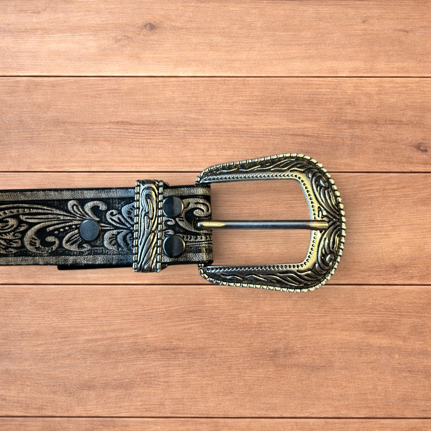Vintage style faux leather western cowboy gothic belt in black with silver trim.