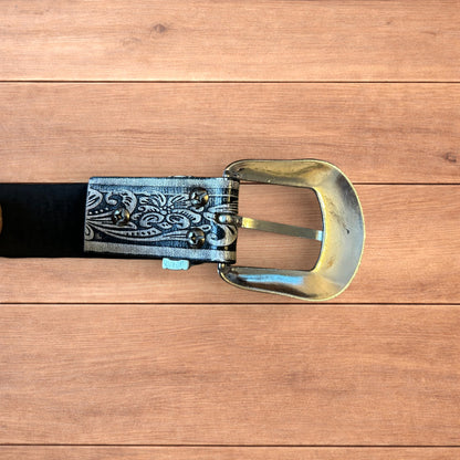 Vintage style faux leather western cowboy gothic belt in black with silver trim.