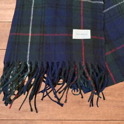 Tartan plaid cashmere scarf in dark green and navy.