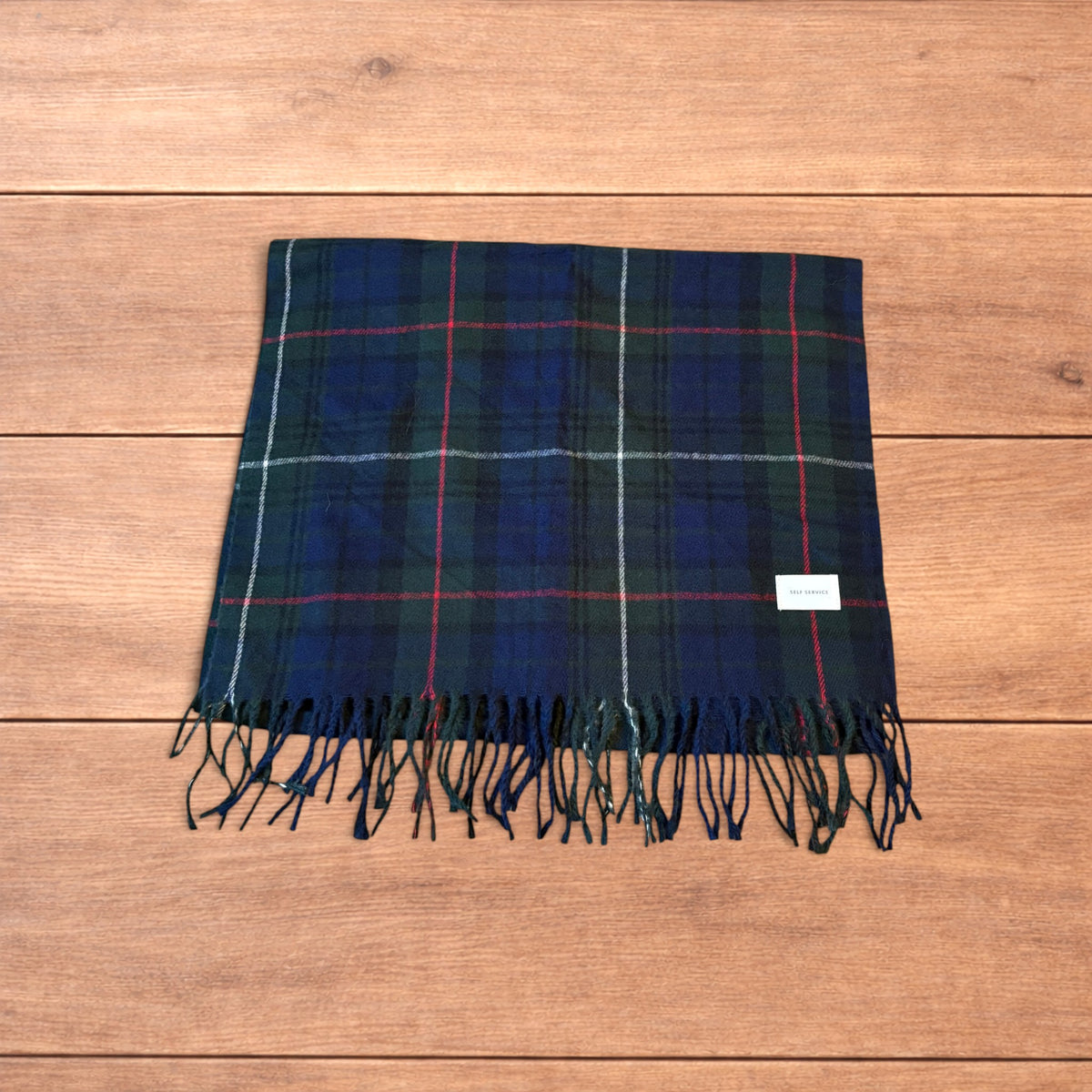 Tartan plaid cashmere scarf in dark green and navy.
