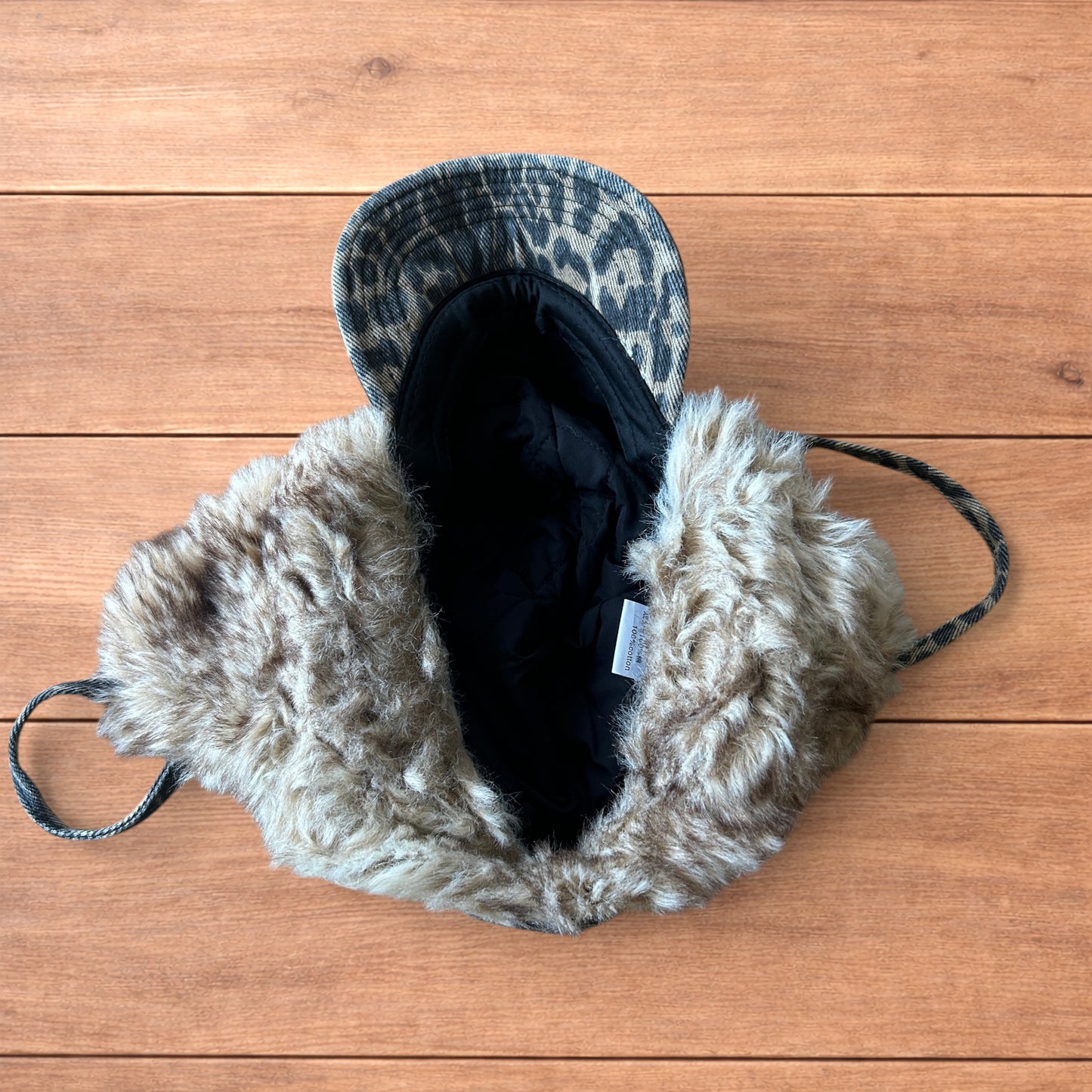 Vintage style trapper Russian ear flap hat cap in leopard & beige colour way.