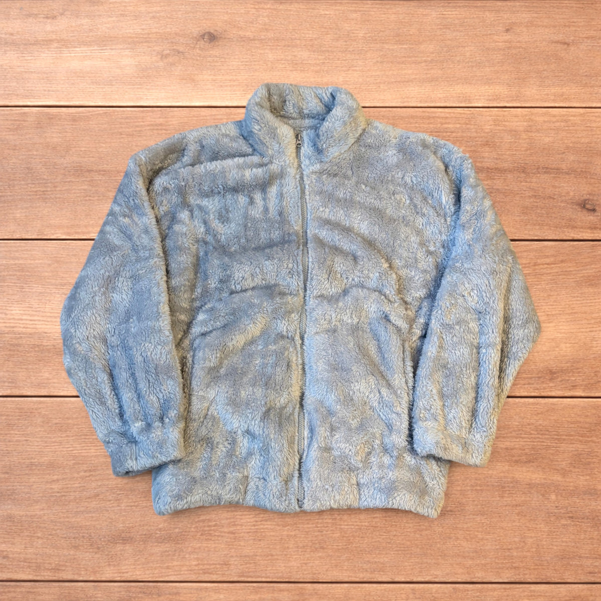 Pale blue fluffy fleece full zip jacket with elasticated hem and high neck