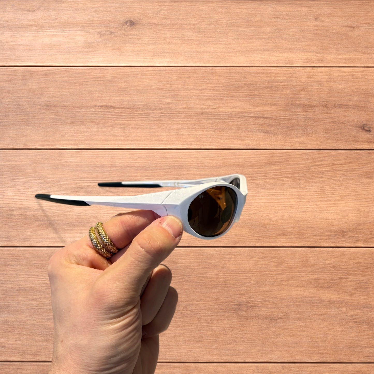 Insane mirrored polarised sunglasses in white with brown lense.