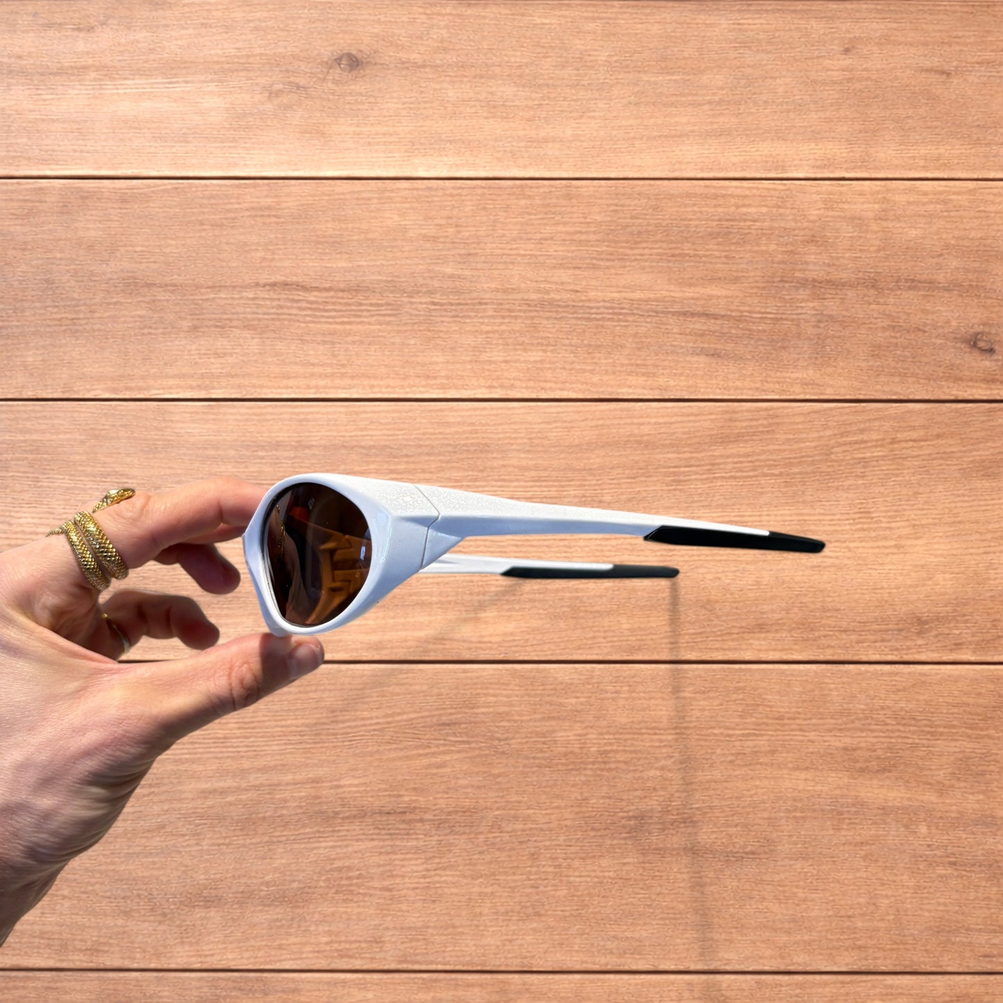 Insane mirrored polarised sunglasses in white with brown lense.