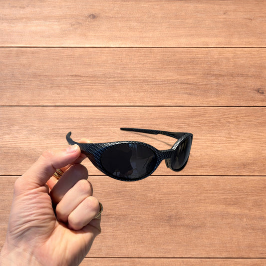 Insane mirrored polarised sunglasses in carbon graphite with black lense.