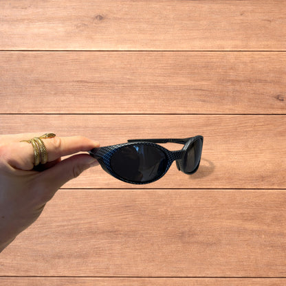 Insane mirrored polarised sunglasses in carbon graphite with black lense.