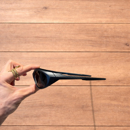 Insane mirrored polarised sunglasses in carbon graphite with black lense.