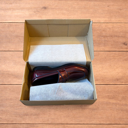Lovely faux leather penny dress loafers shoes in oxblood red.