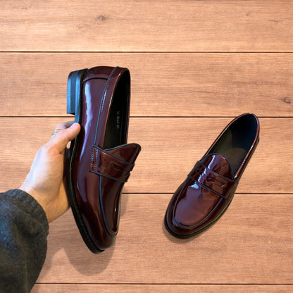 Lovely faux leather penny dress loafers shoes in oxblood red.