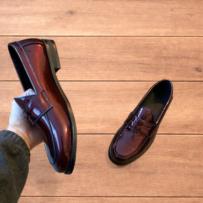 Lovely faux leather penny dress loafers shoes in oxblood red.