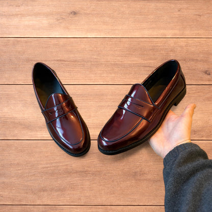 Lovely faux leather penny dress loafers shoes in oxblood red.