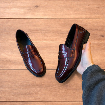 Lovely faux leather penny dress loafers shoes in oxblood red.