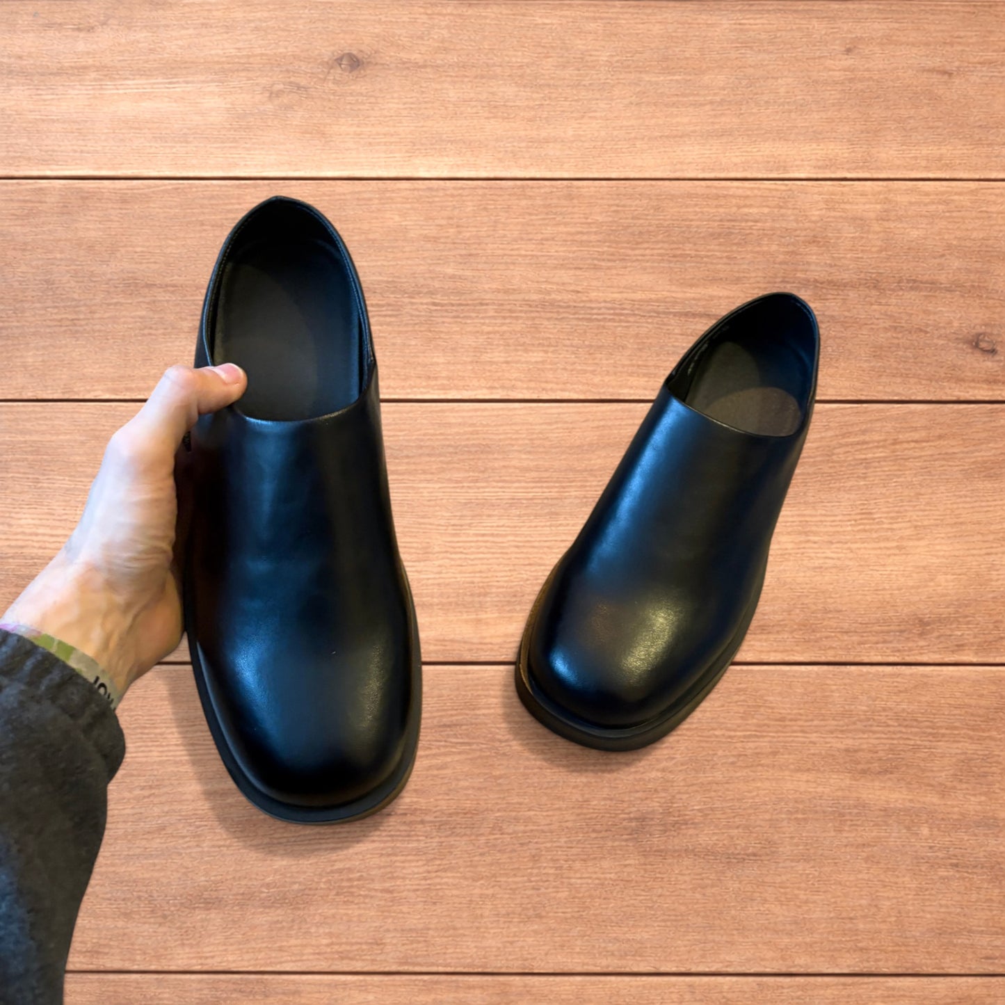 Lovely faux leather slip on loafers shoes in black.