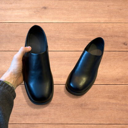 Lovely faux leather slip on loafers shoes in black.
