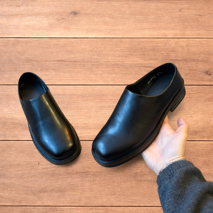 Lovely faux leather slip on loafers shoes in black.