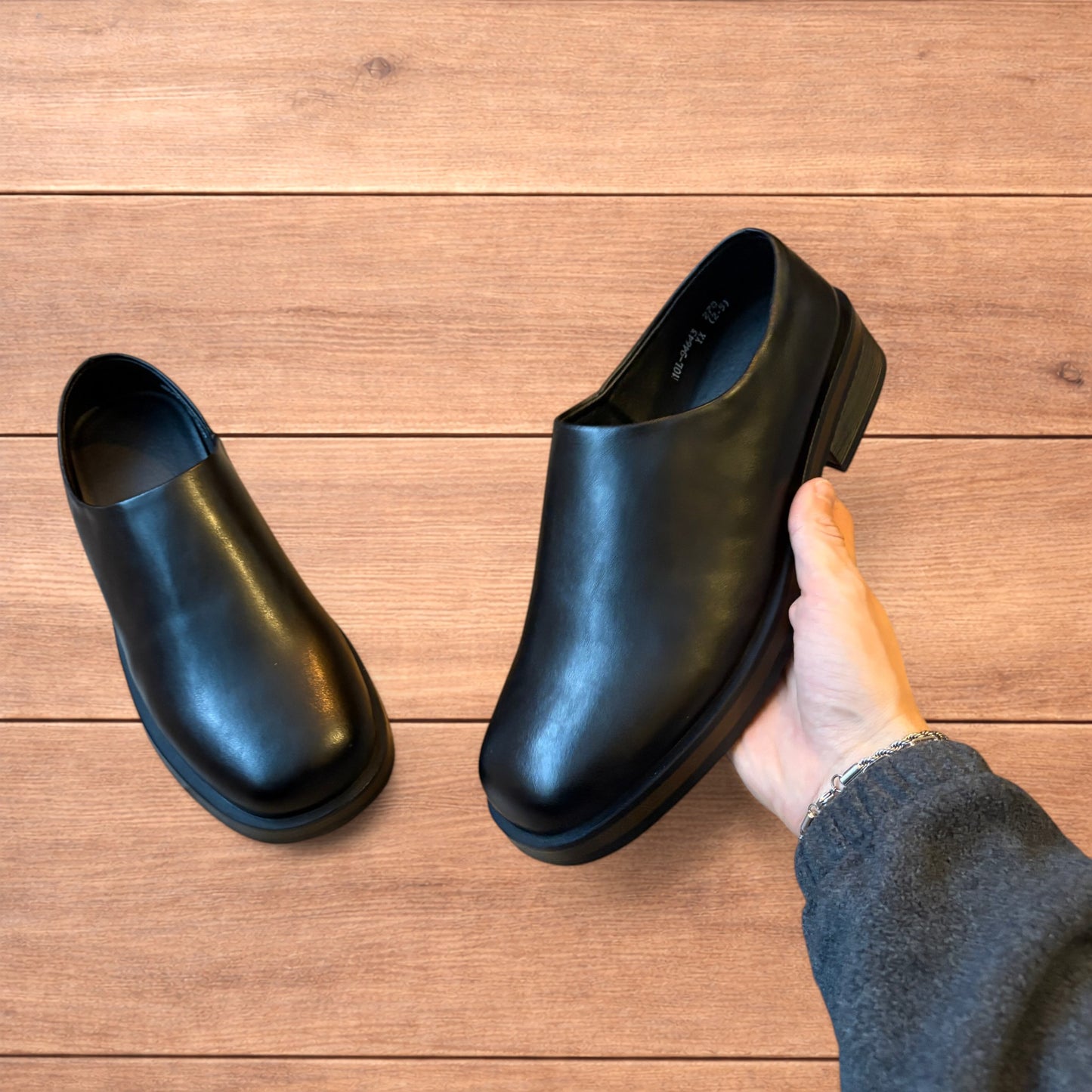 Lovely faux leather slip on loafers shoes in black.