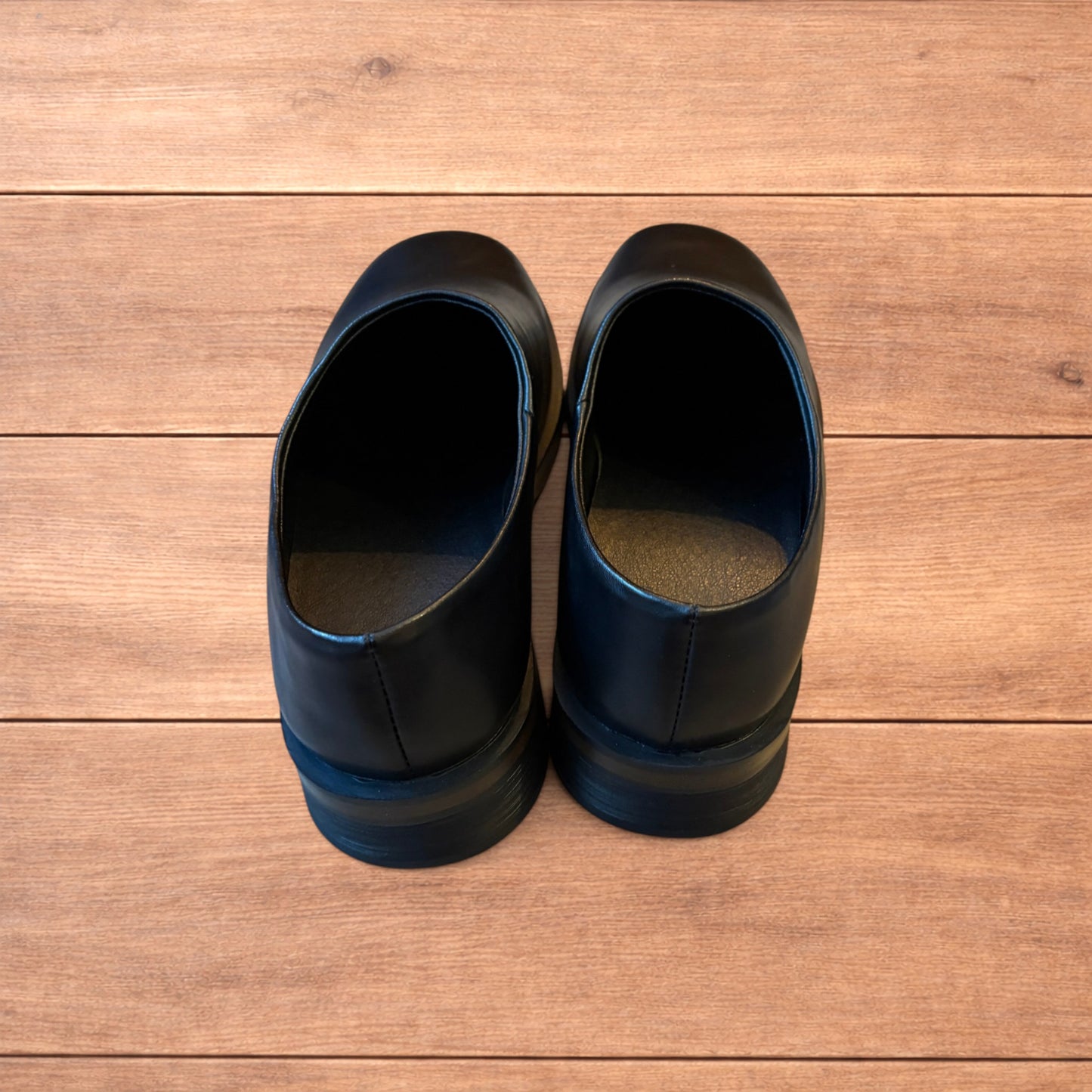 Lovely faux leather slip on loafers shoes in black.
