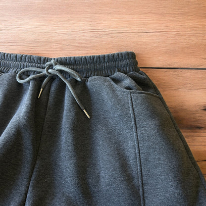 Super baggy wide leg Korean joggers in dark grey.