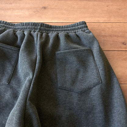 Super baggy wide leg Korean joggers in dark grey.