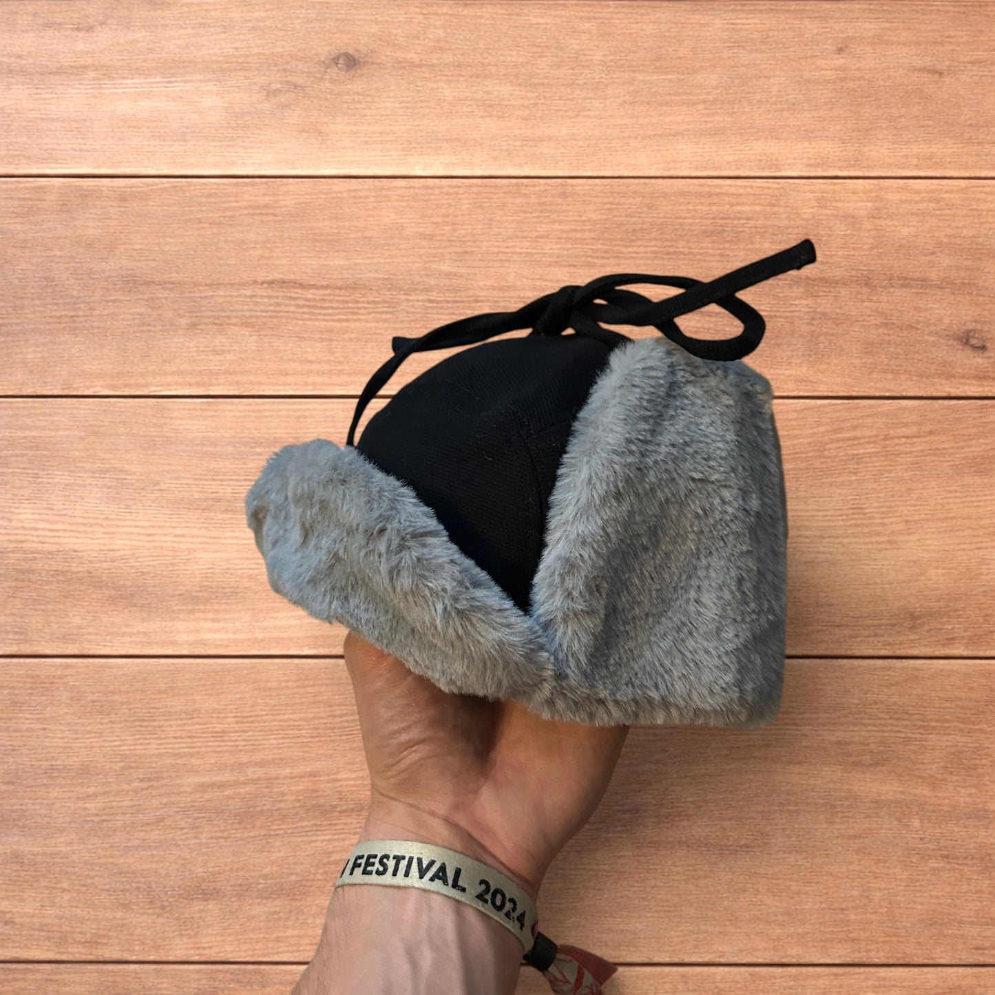 Russian ushanka trapper ear flap winter hat in black/grey colour way.