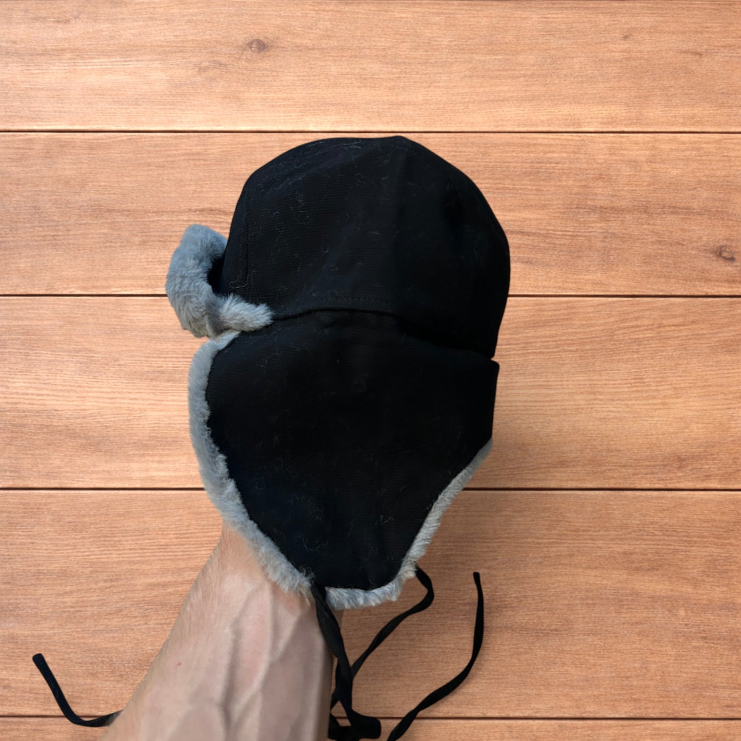 Russian ushanka trapper ear flap winter hat in black/grey colour way.