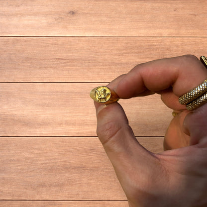 Lovely vintage style stainless steel angel signet ring in gold.