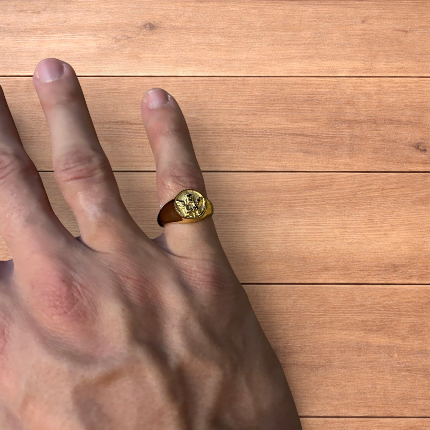 Lovely vintage style stainless steel angel signet ring in gold.