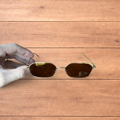 Lovely metal frame polarised sunglasses in gold with brown lense.