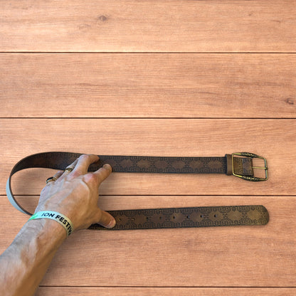 Vintage style faux leather western cowboy belt in brown with bronze trim.