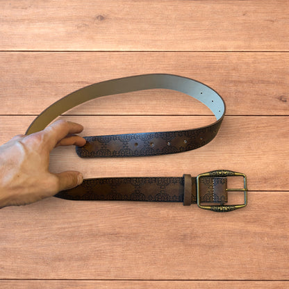 Vintage style faux leather western cowboy belt in brown with bronze trim.
