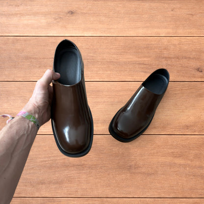 Lovely faux leather slip on loafers shoes in brown.