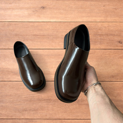 Lovely faux leather slip on loafers shoes in brown.